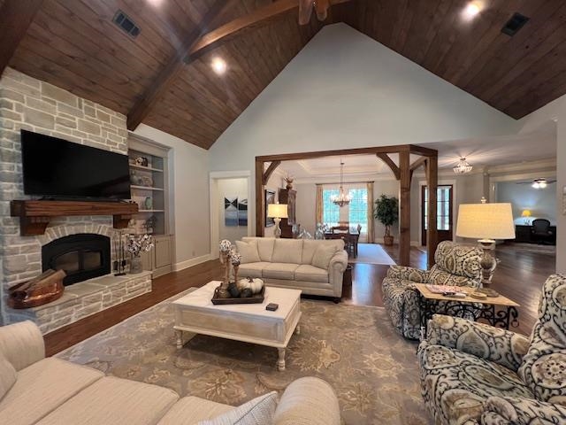 Living room featuring high vaulted ceiling, wooden ceiling, dark hardwood / wood-style floors, and a notable chandelier