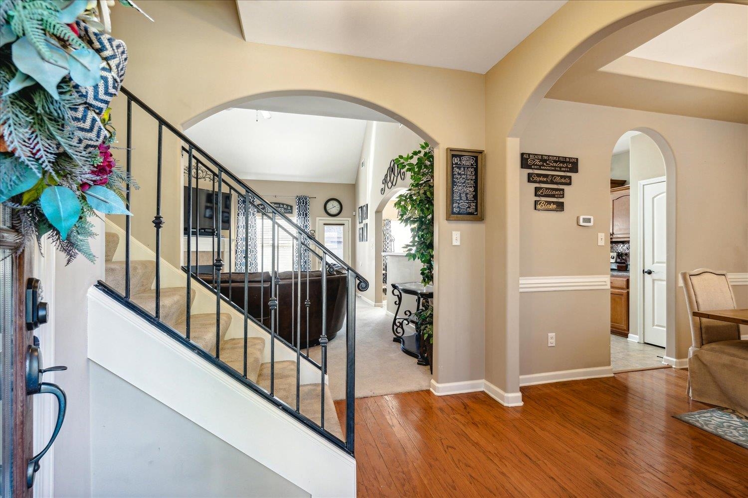 View as you enter the home... Featuring Arched Entry to Great Room and Dining Room