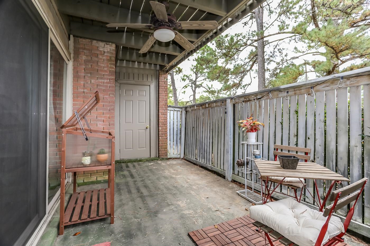 View of patio with ceiling fan