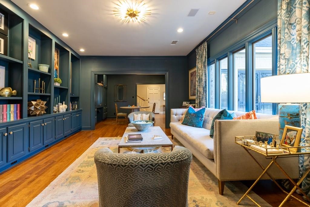 Living room with light hardwood / wood-style flooring