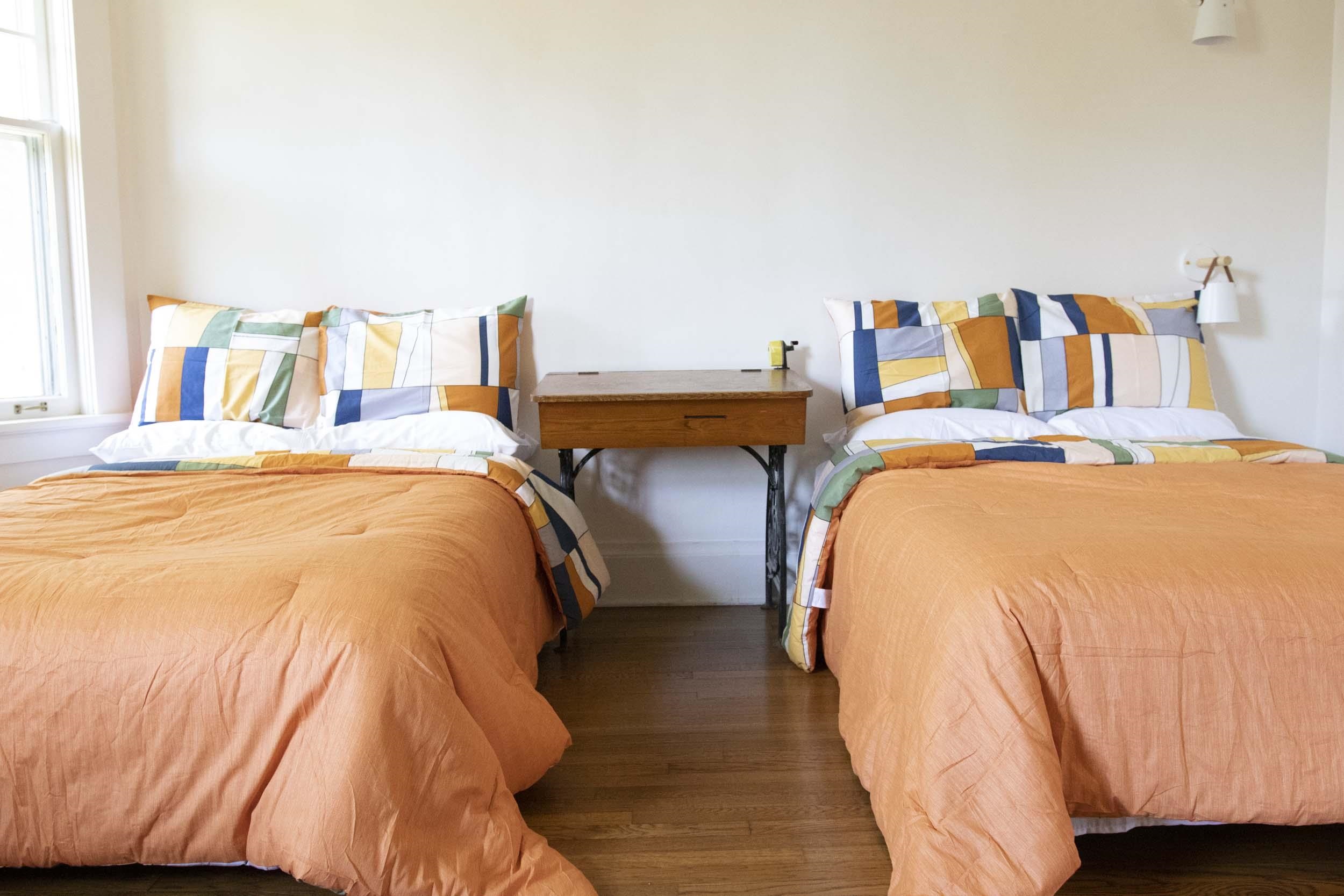 Bedroom with dark wood-type flooring