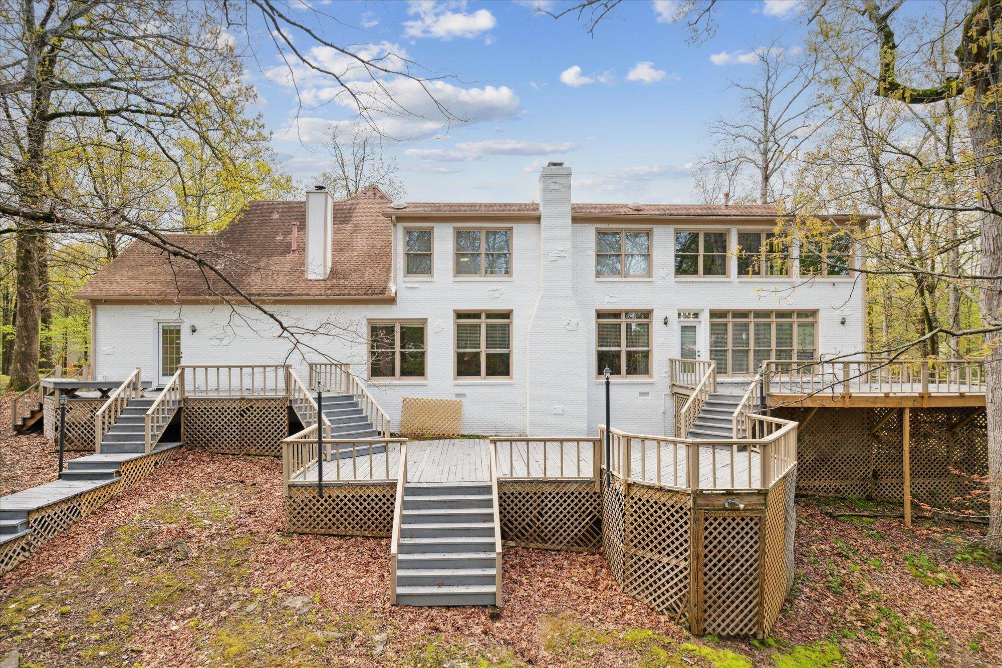 Back of house featuring a deck