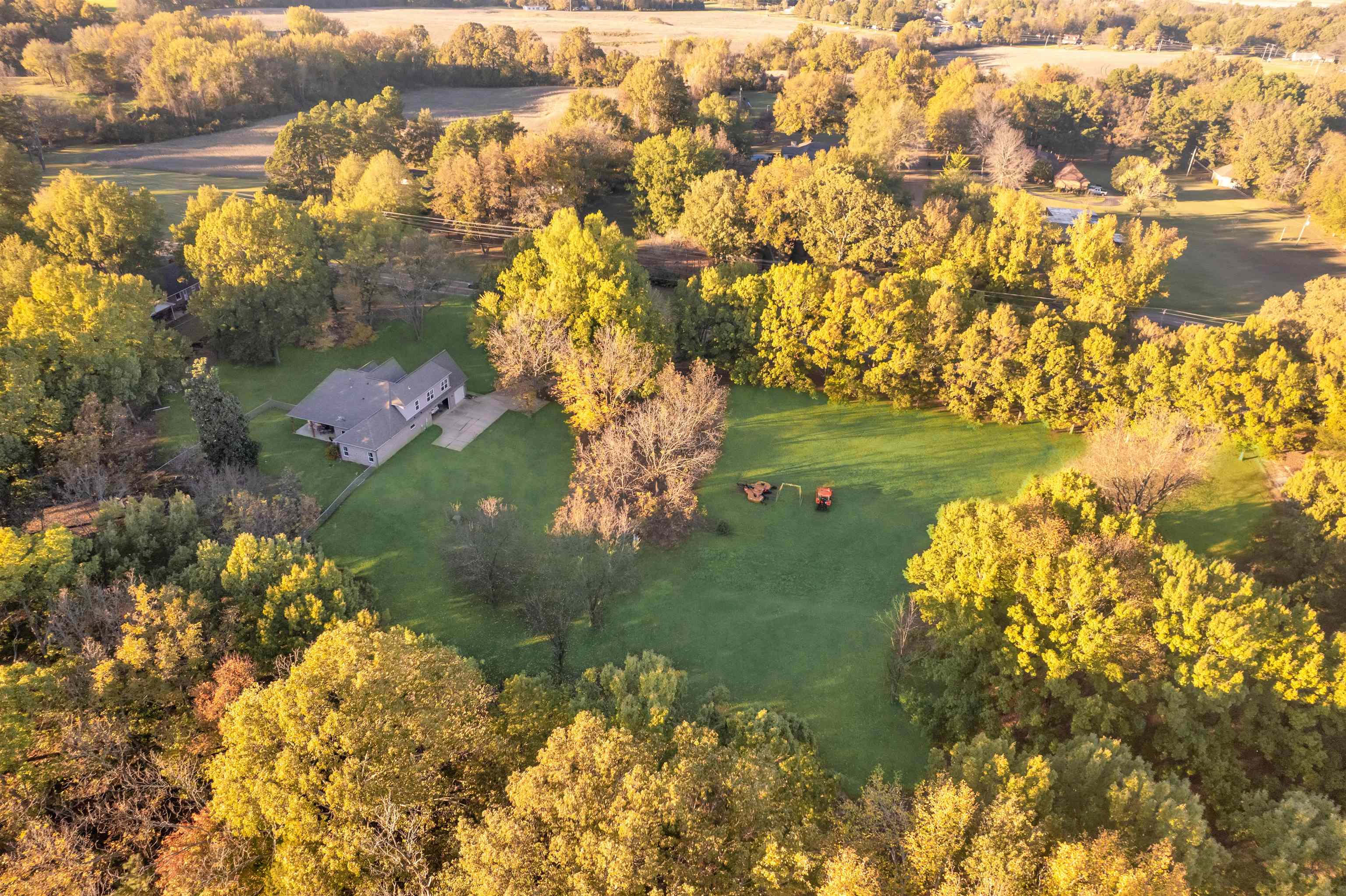 Birds eye view of property with a rural view