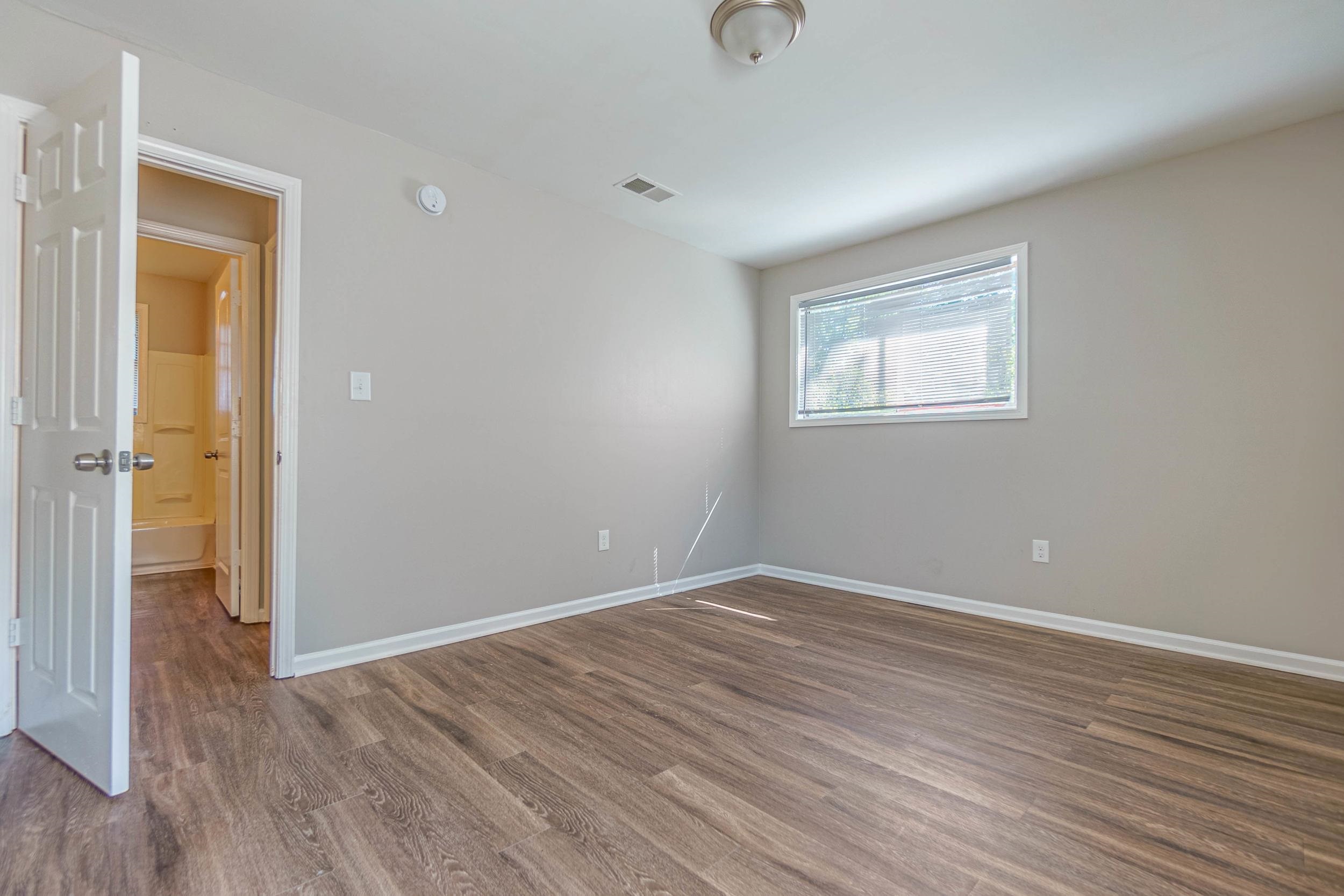 Unfurnished room featuring hardwood / wood-style floors