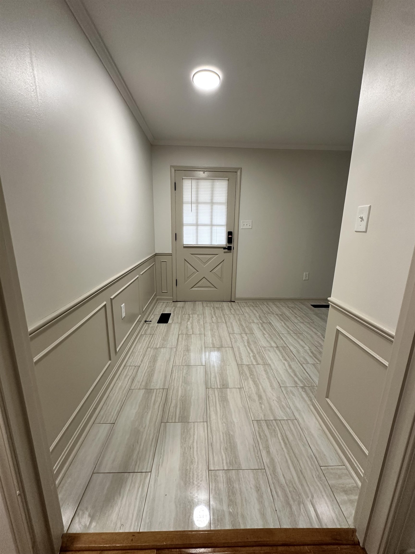 Interior space featuring crown molding