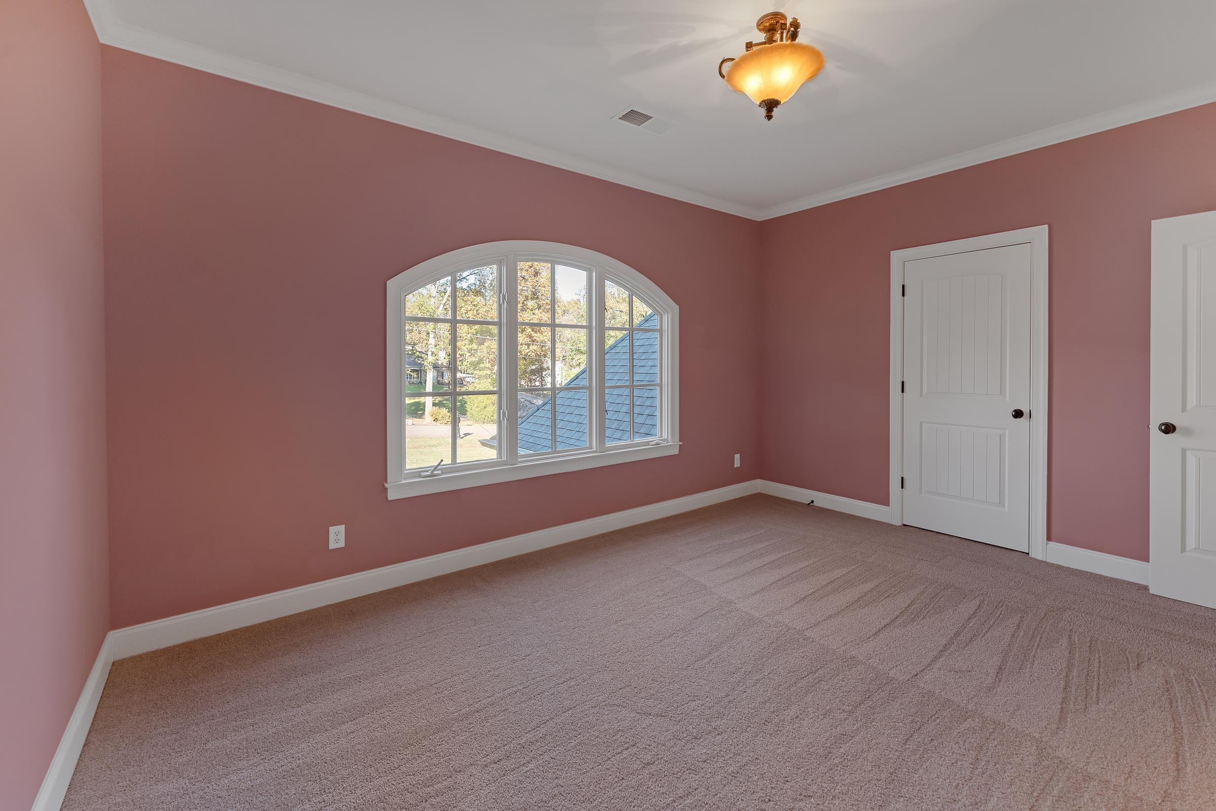 Bedroom 3 is upstairs with beautiful casement windows and new carpet