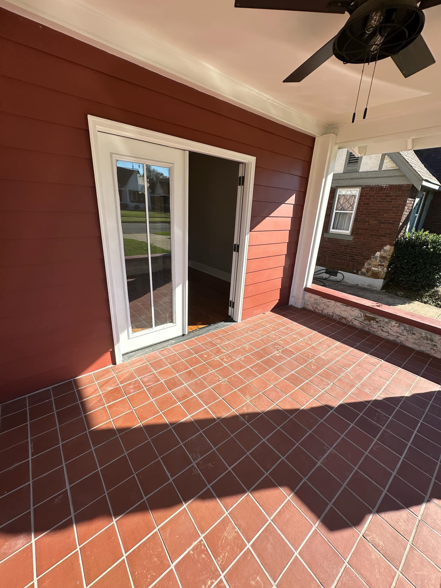 View of patio featuring ceiling fan