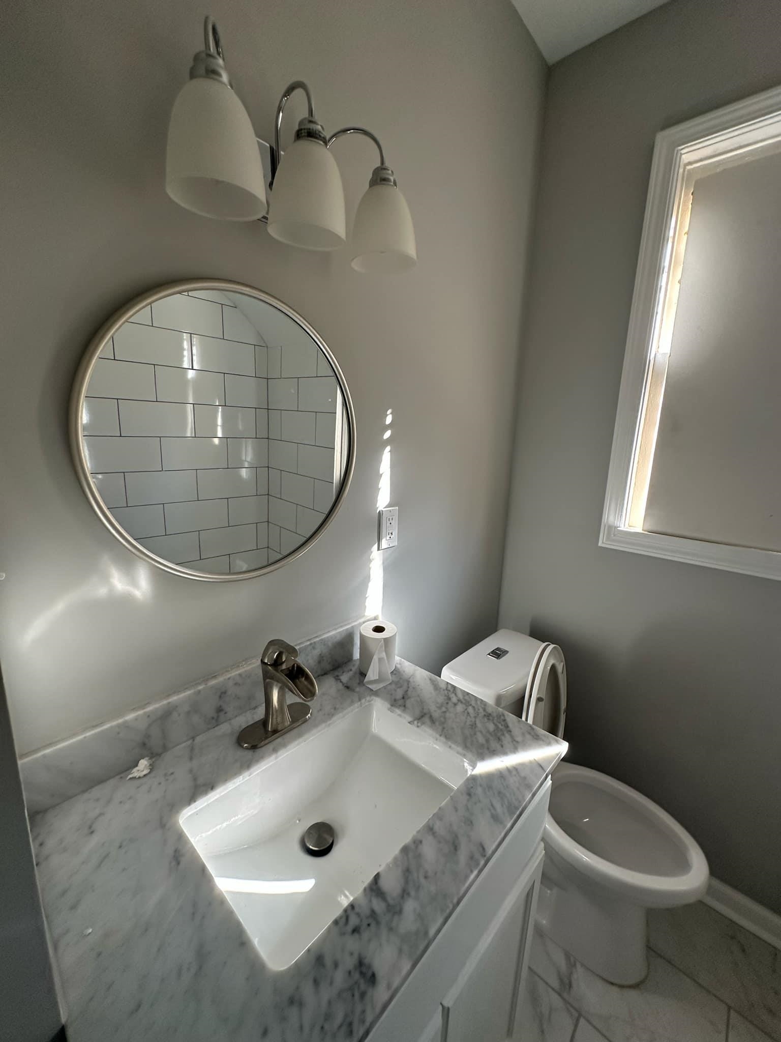 Bathroom with vanity and toilet
