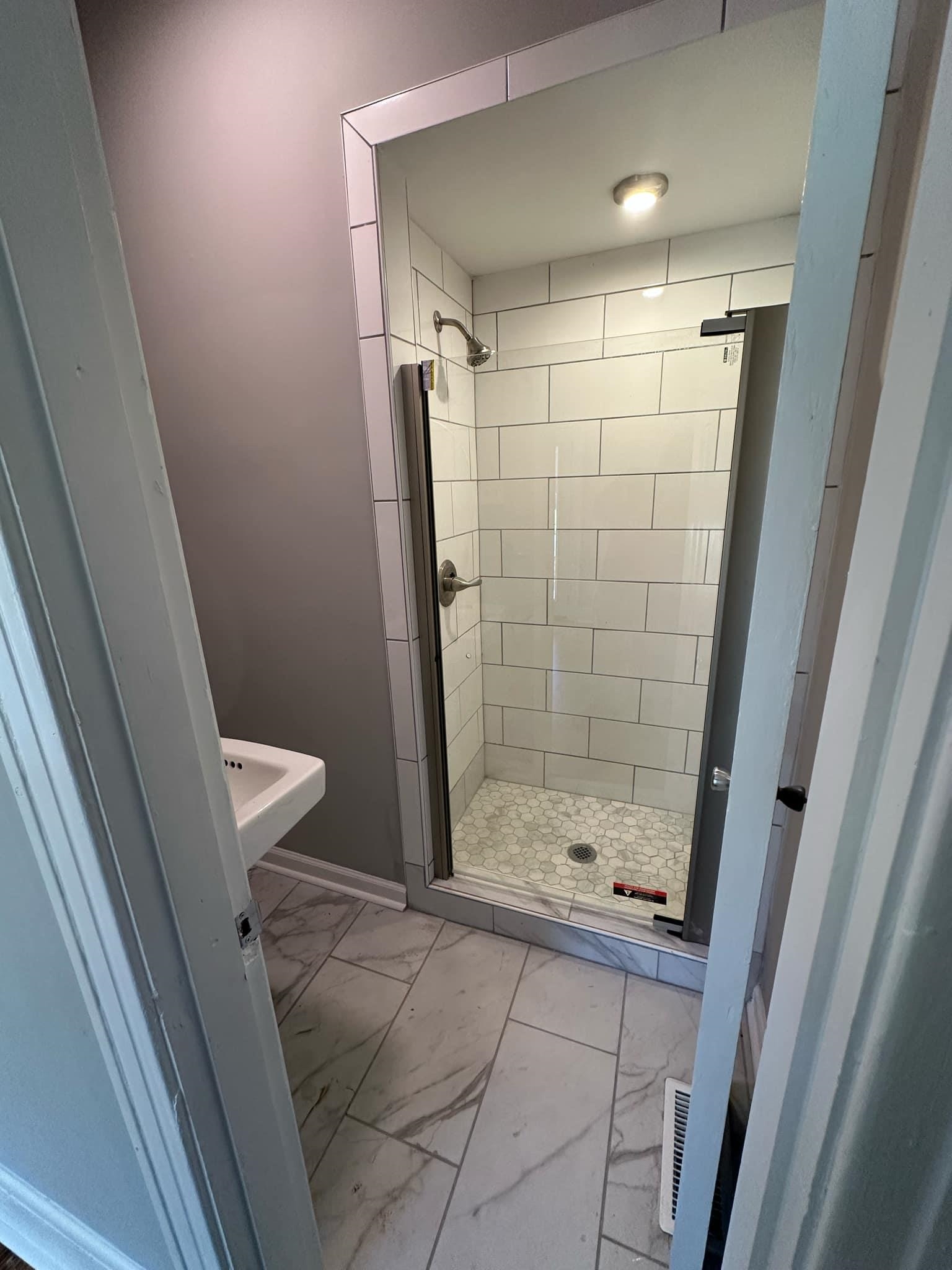 Bathroom with tiled shower