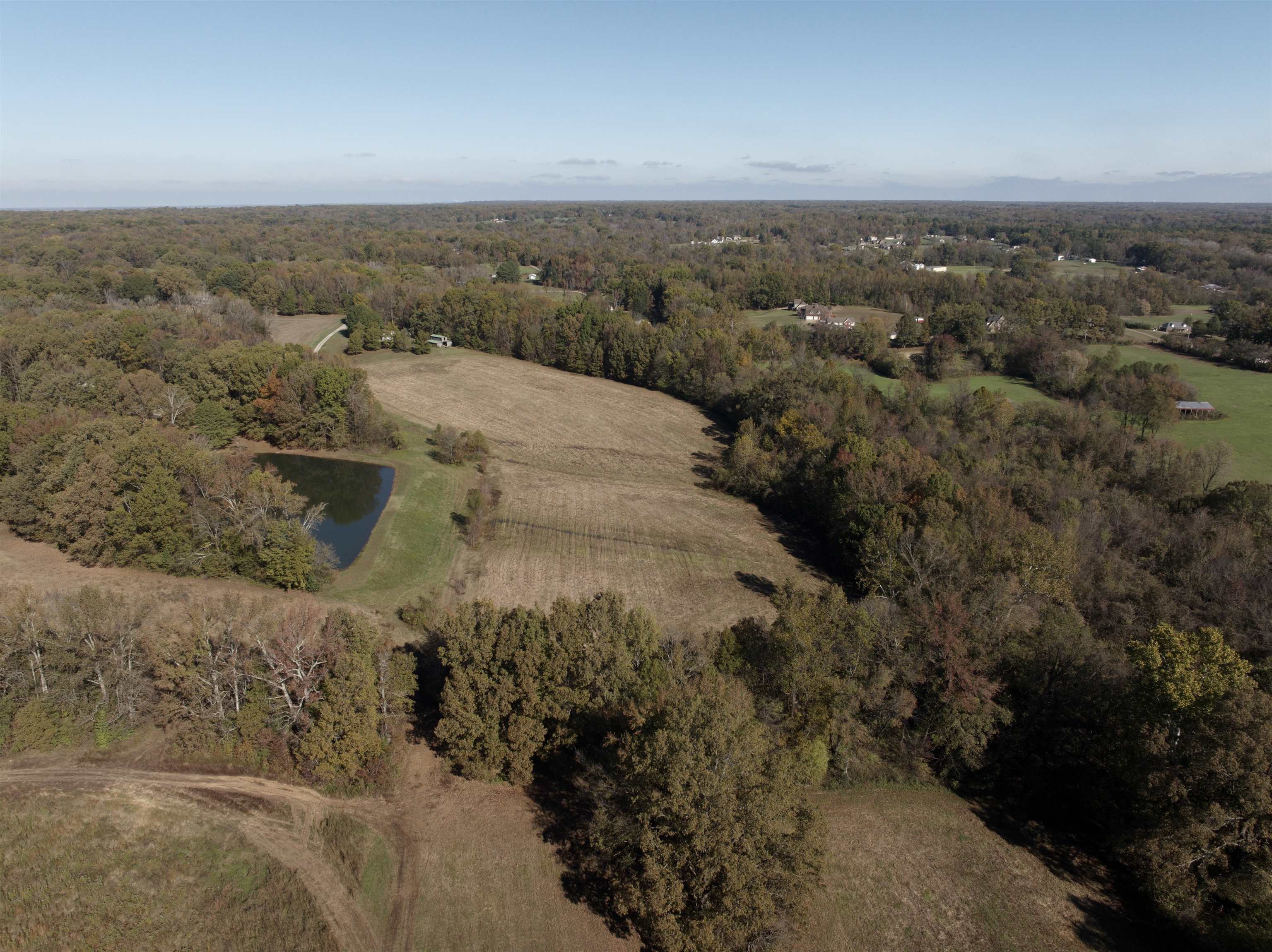 Aerial view with a water view. Parcel to the right of the pond