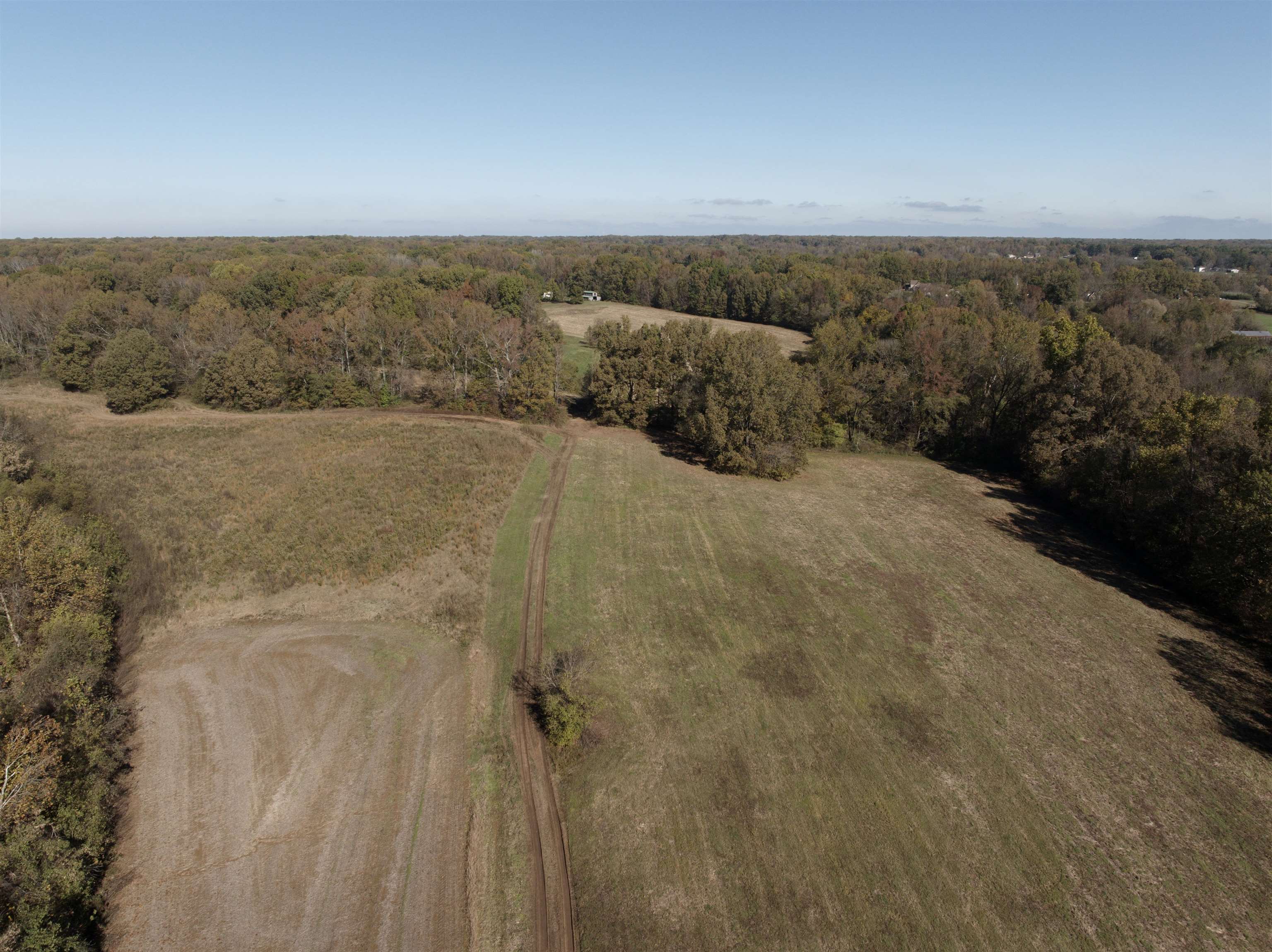 Drone / aerial view featuring a rural view. Parcel is to the right of the \