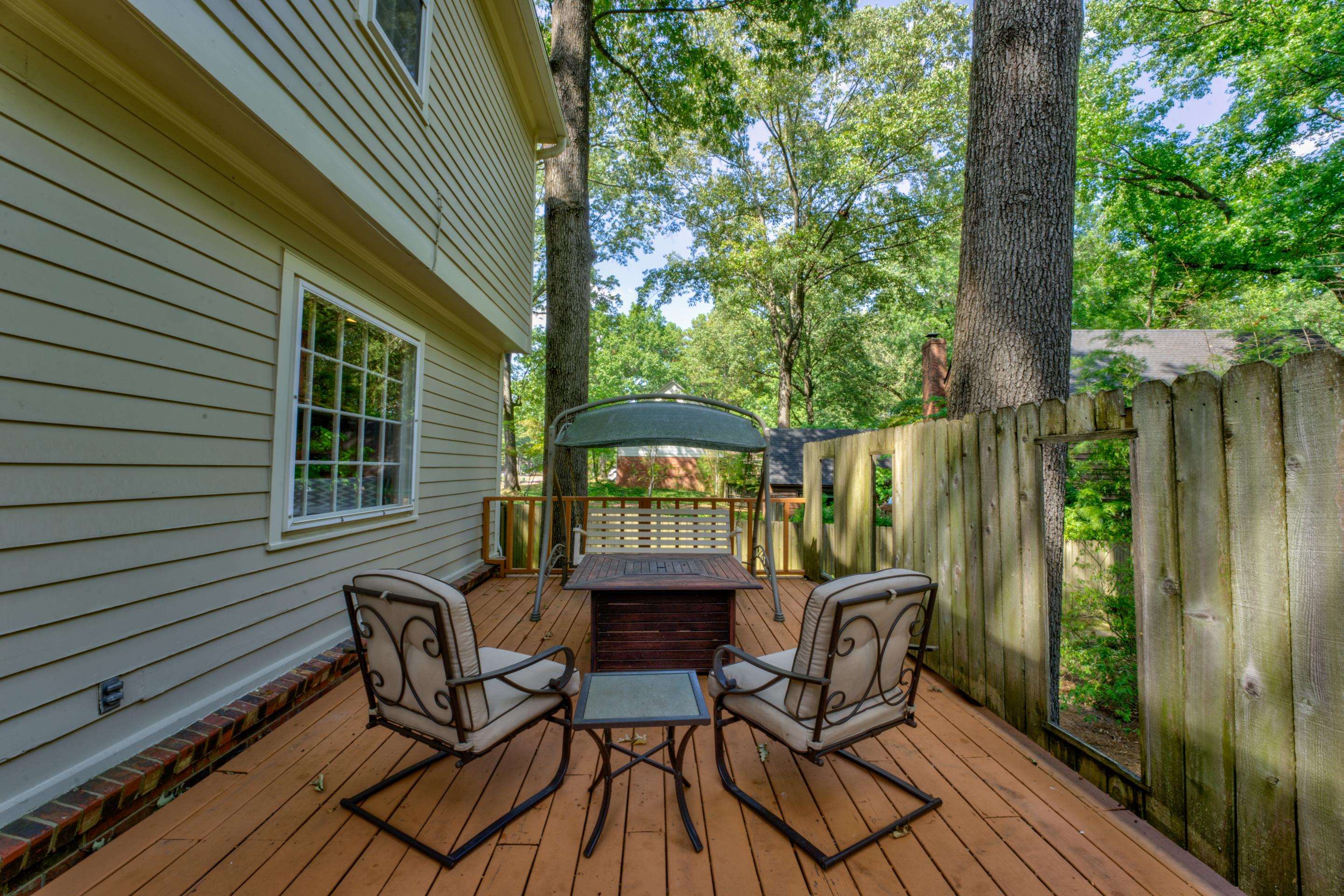 Deck featuring an outdoor fire pit