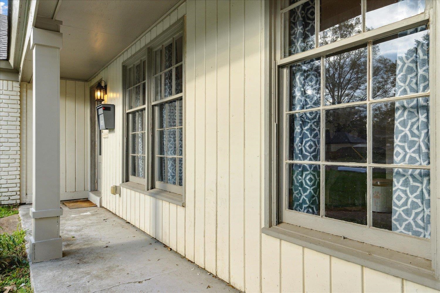Exterior space featuring covered porch