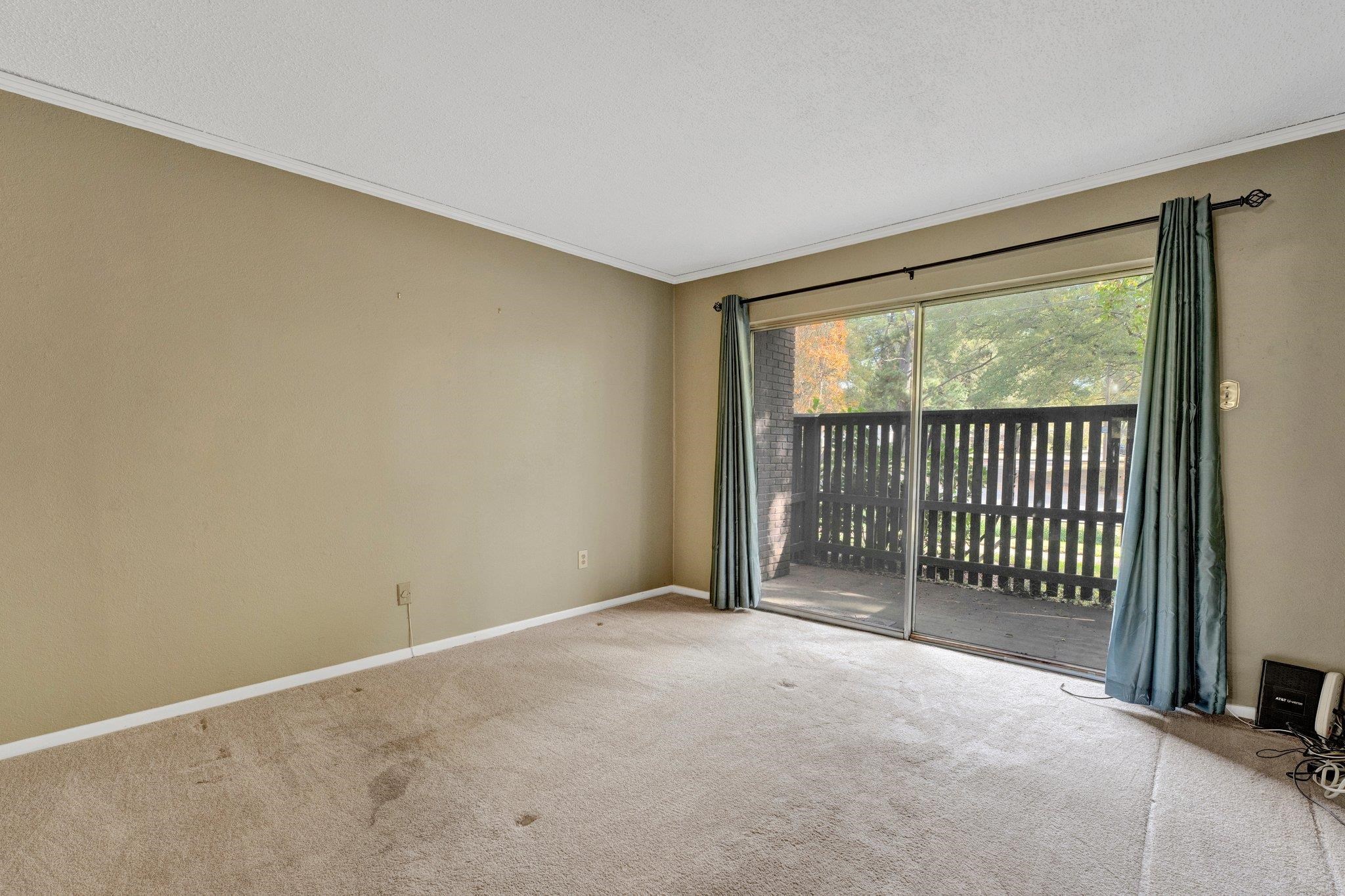 Primary bedroom with private patio
