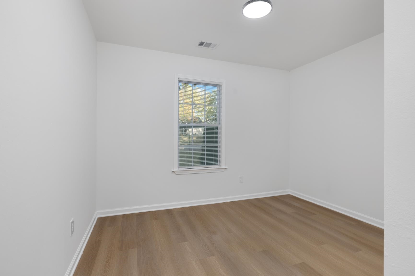 Unfurnished room featuring light hardwood / wood-style floors