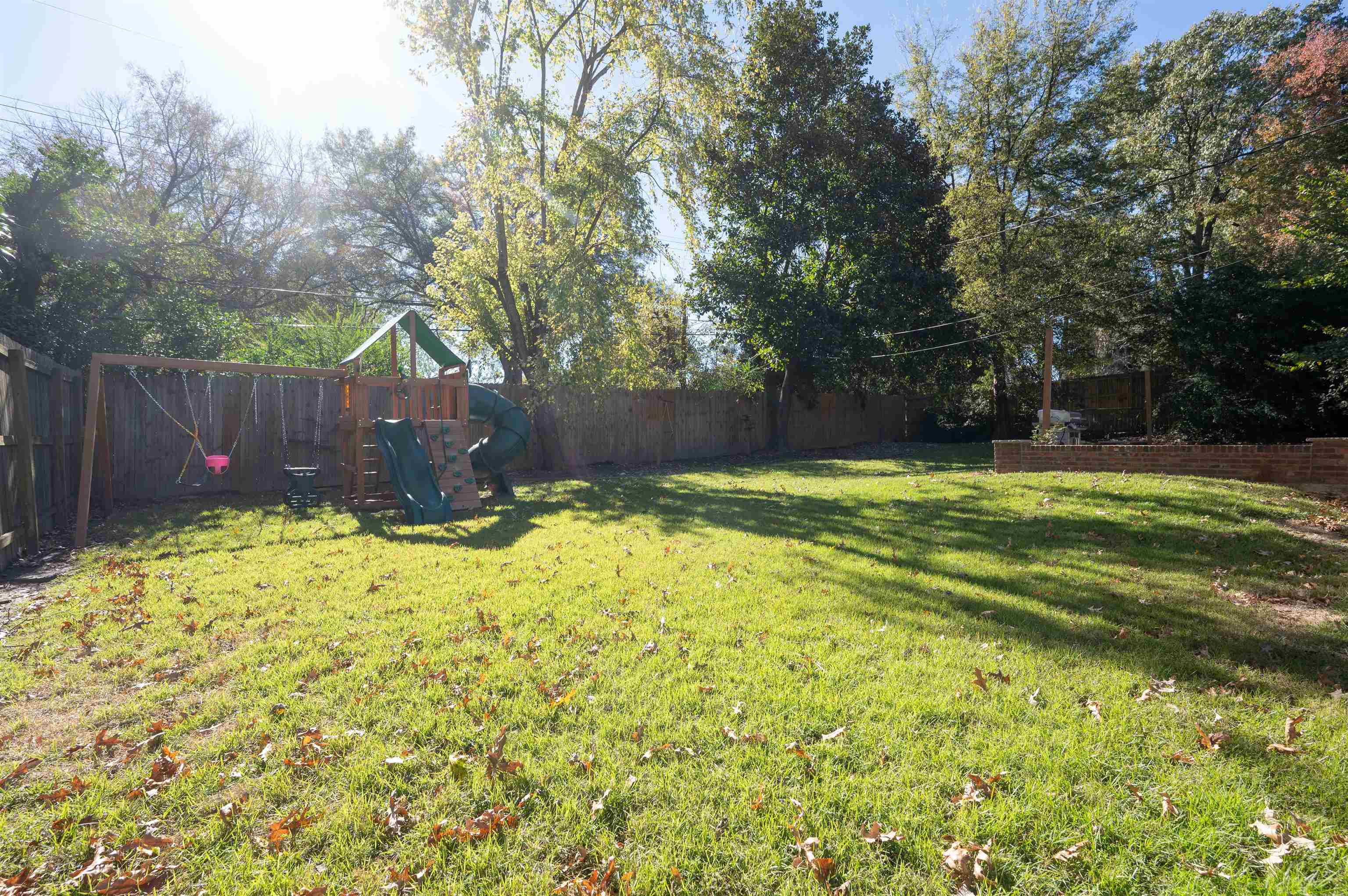 View of yard featuring a playground