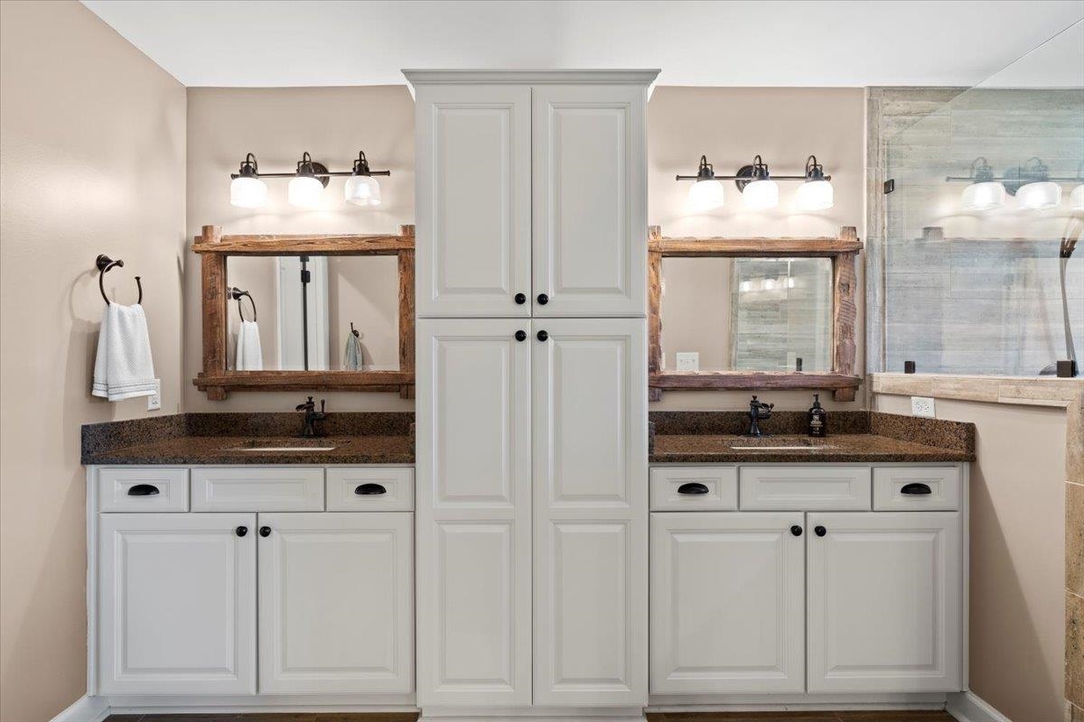 Bathroom featuring vanity and walk in shower