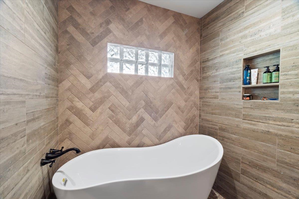 Bathroom featuring a bathing tub