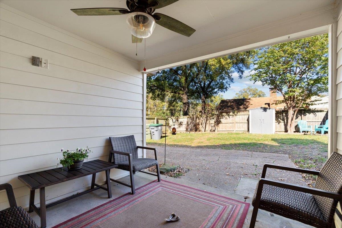 View of patio / terrace with a shed