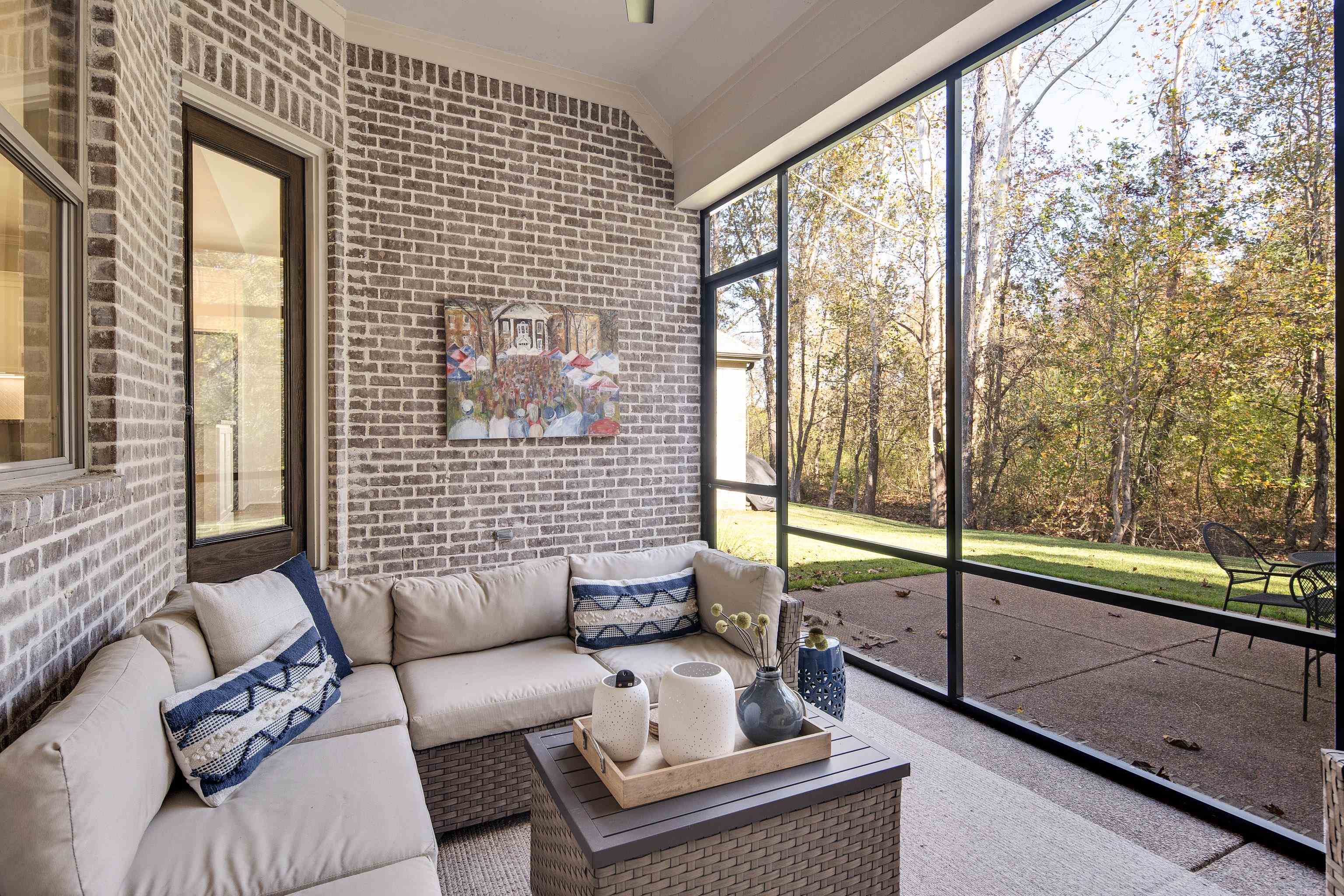 Sunroom featuring vaulted ceiling