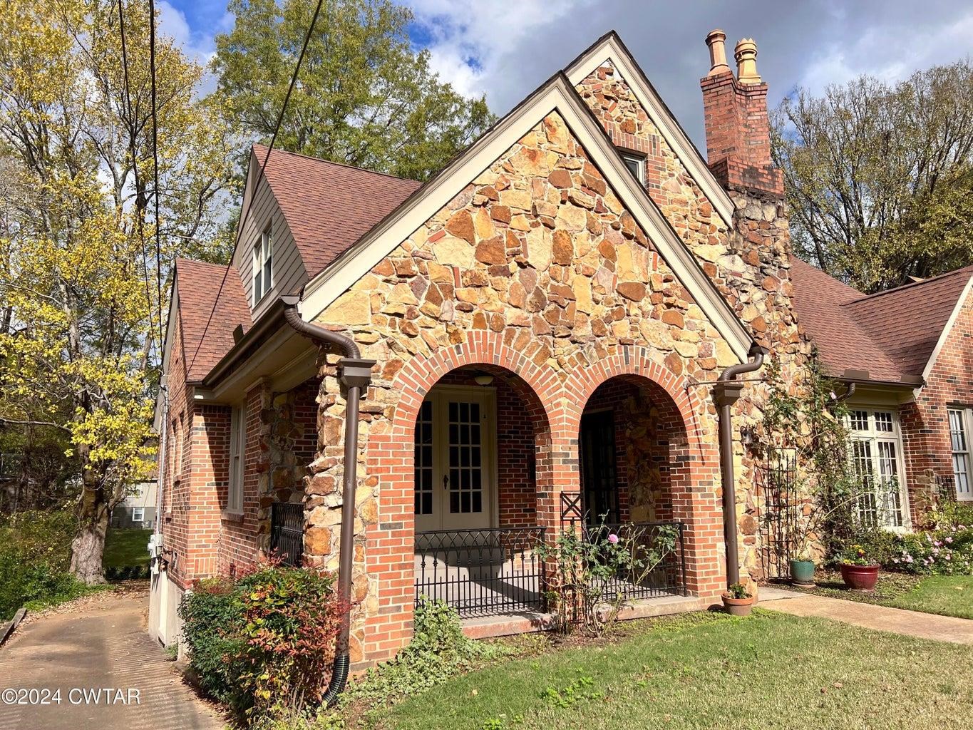 Tudor home with a porch