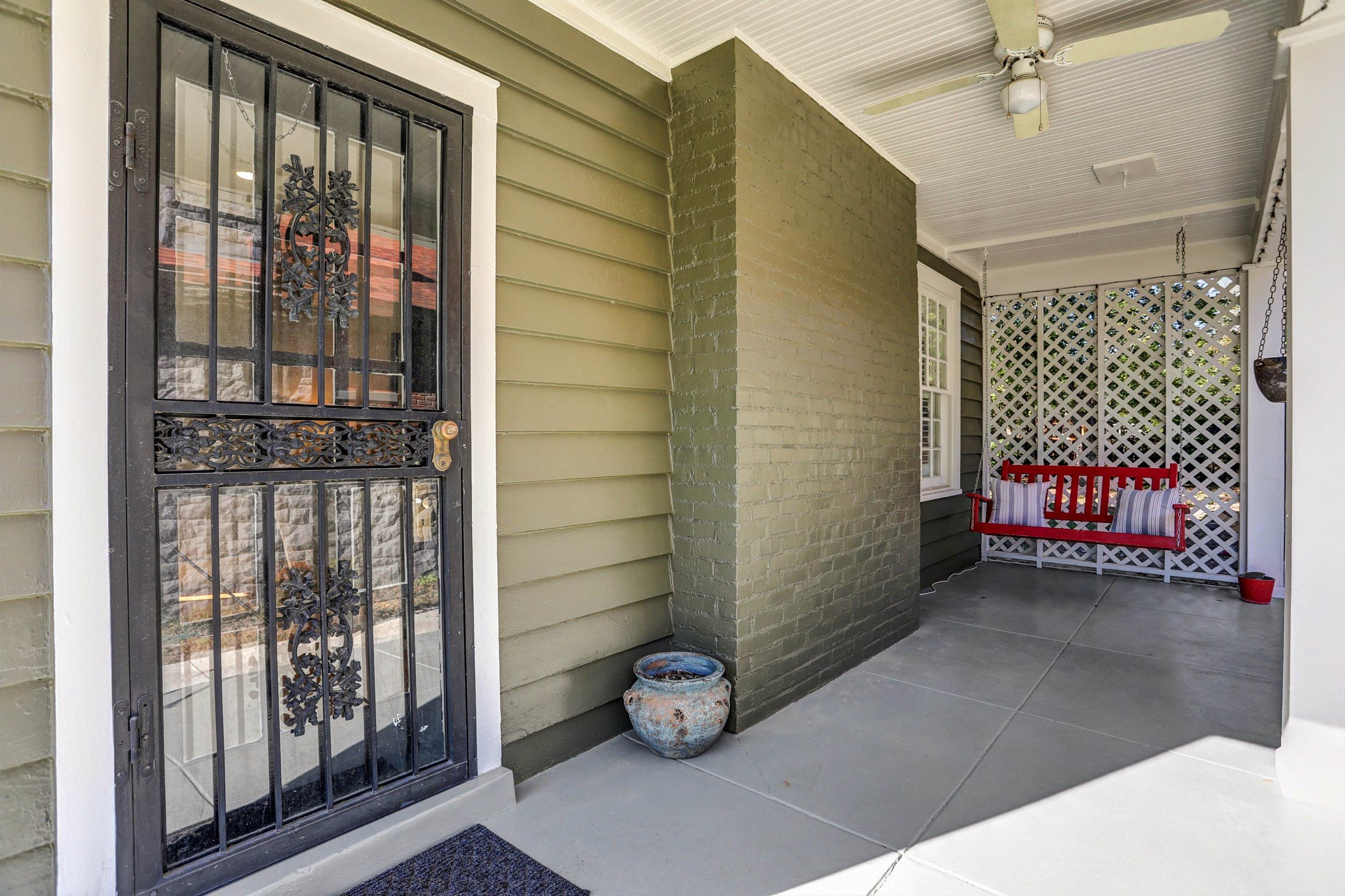 Property entrance with covered porch