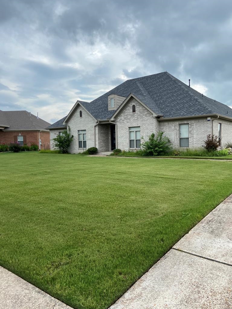 View of front of home with a front yard