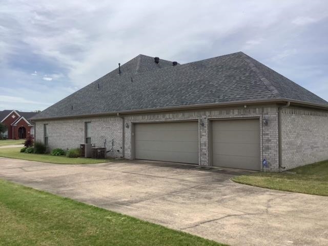 View of home\'s exterior with a garage