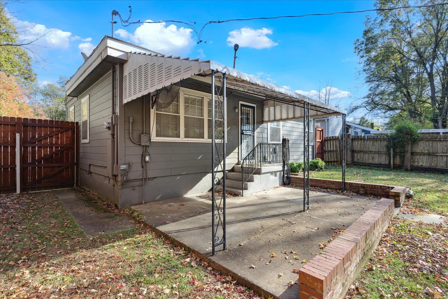 View of front of property with a patio area