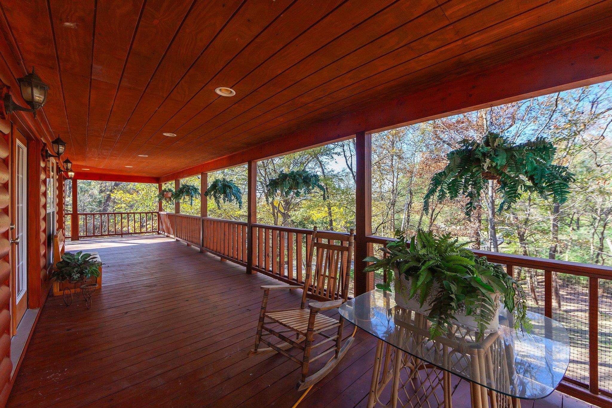 Deck featuring covered porch