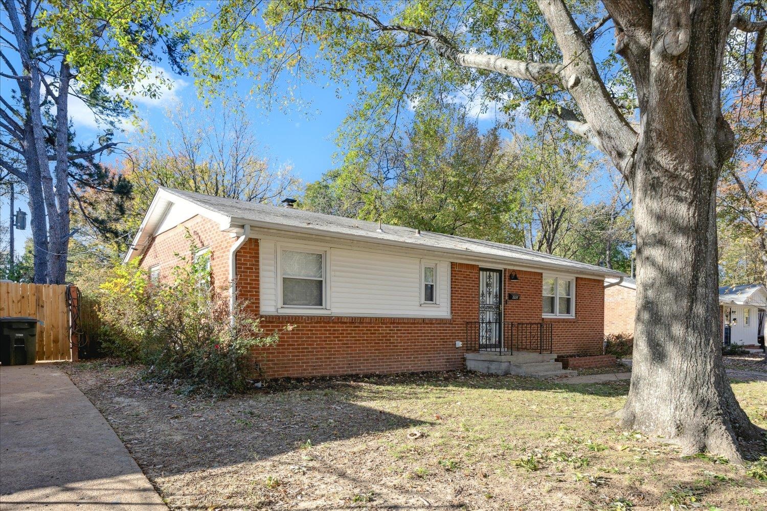 Single story home featuring a front yard