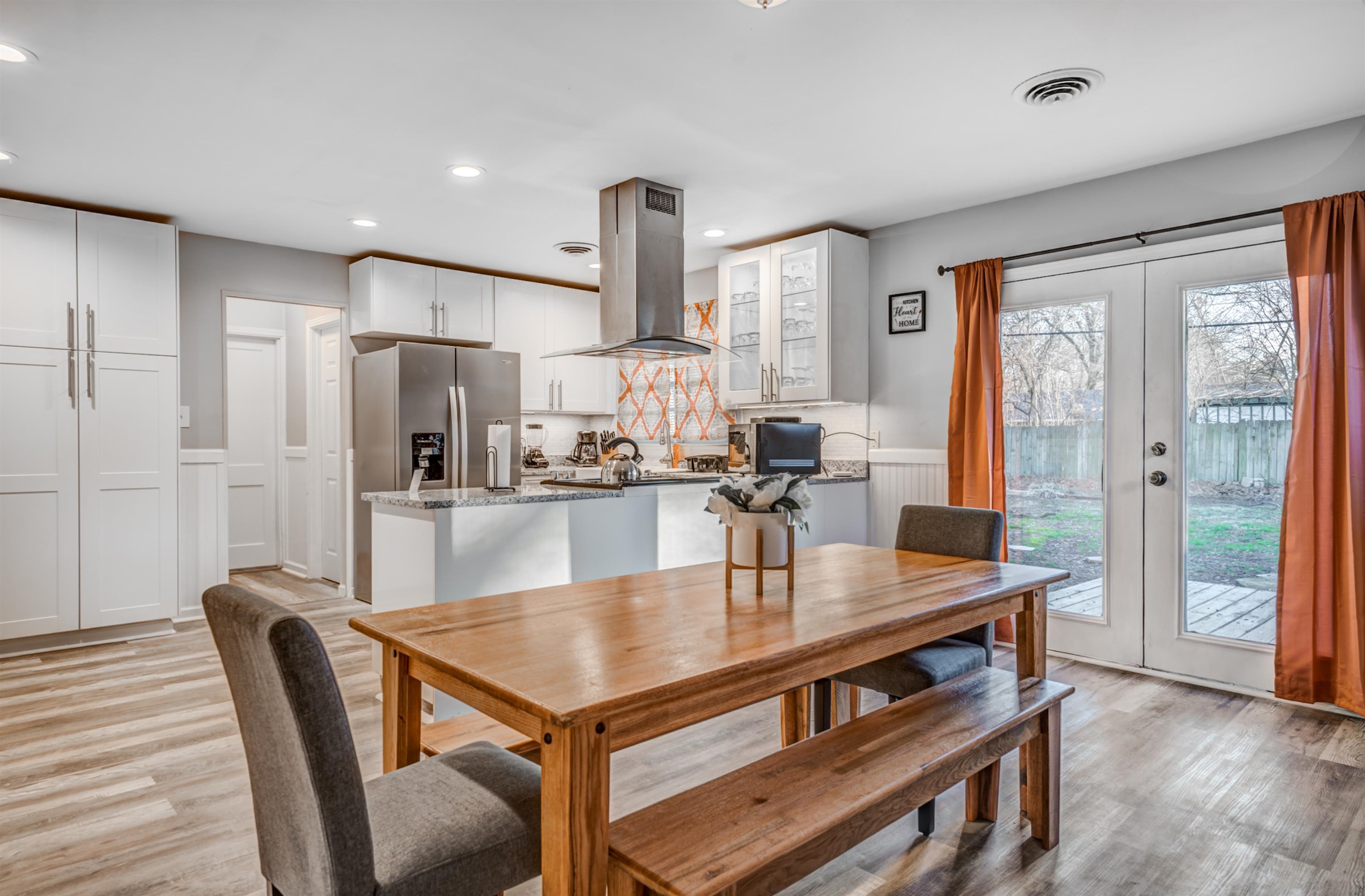 Dining area featuring french doors and light hardwood / wood-style floors