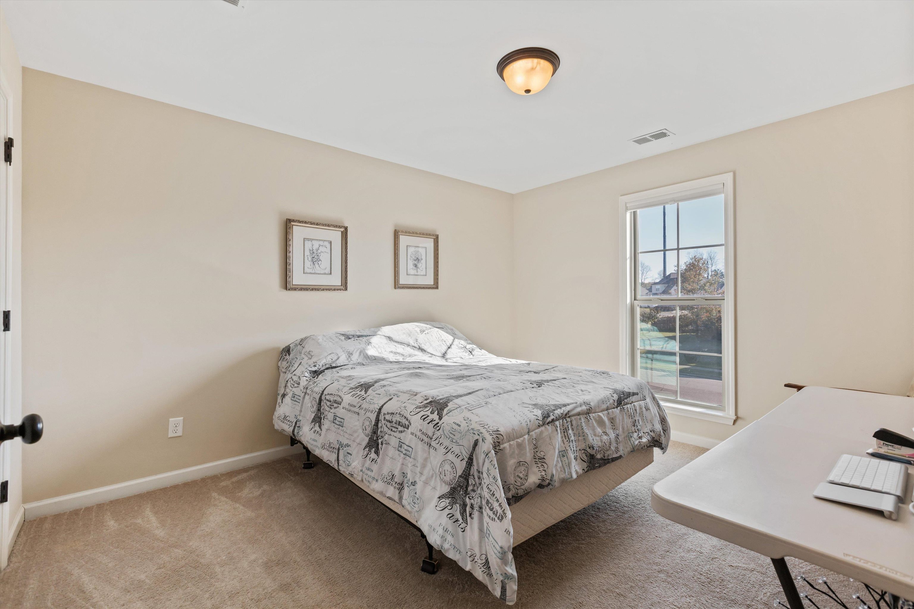 Bedroom featuring carpet