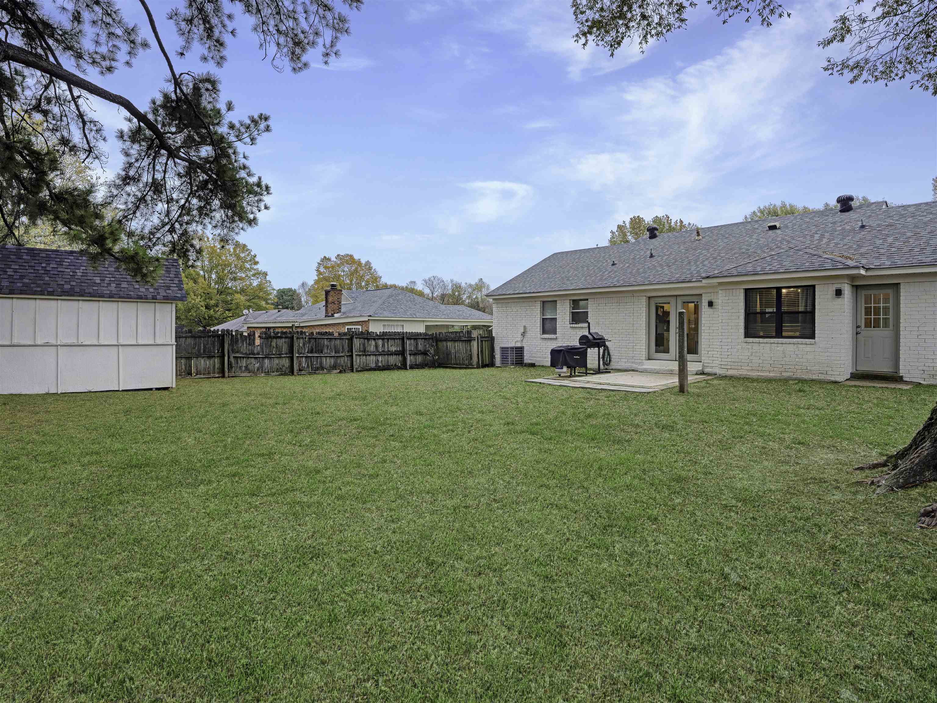 View of yard with a patio