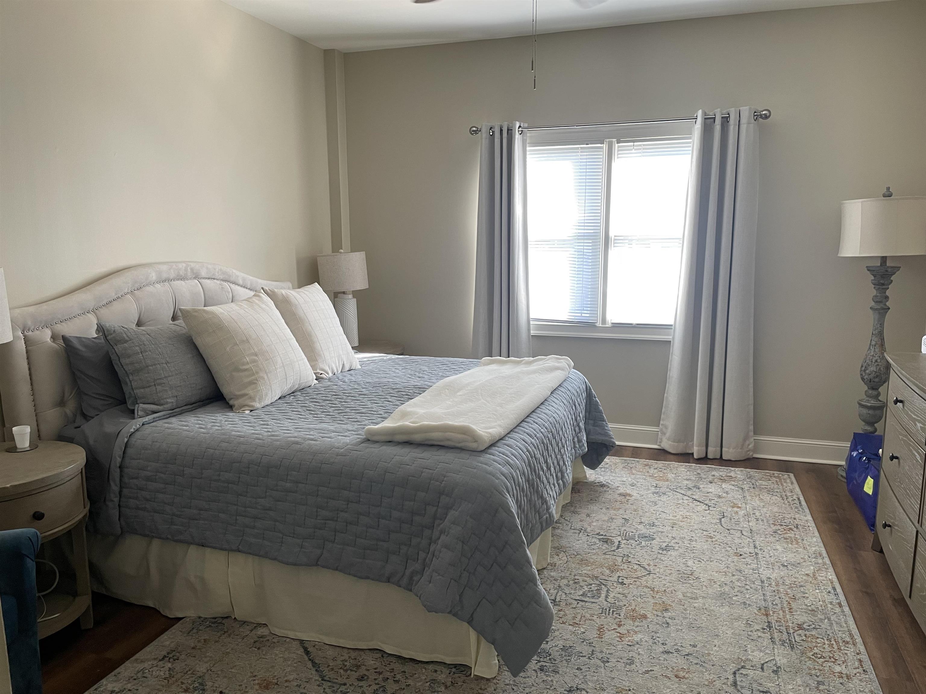 Spacious bedroom with adjoining dressing area and walk-in shower.  Lots of storage and walk-in closet.