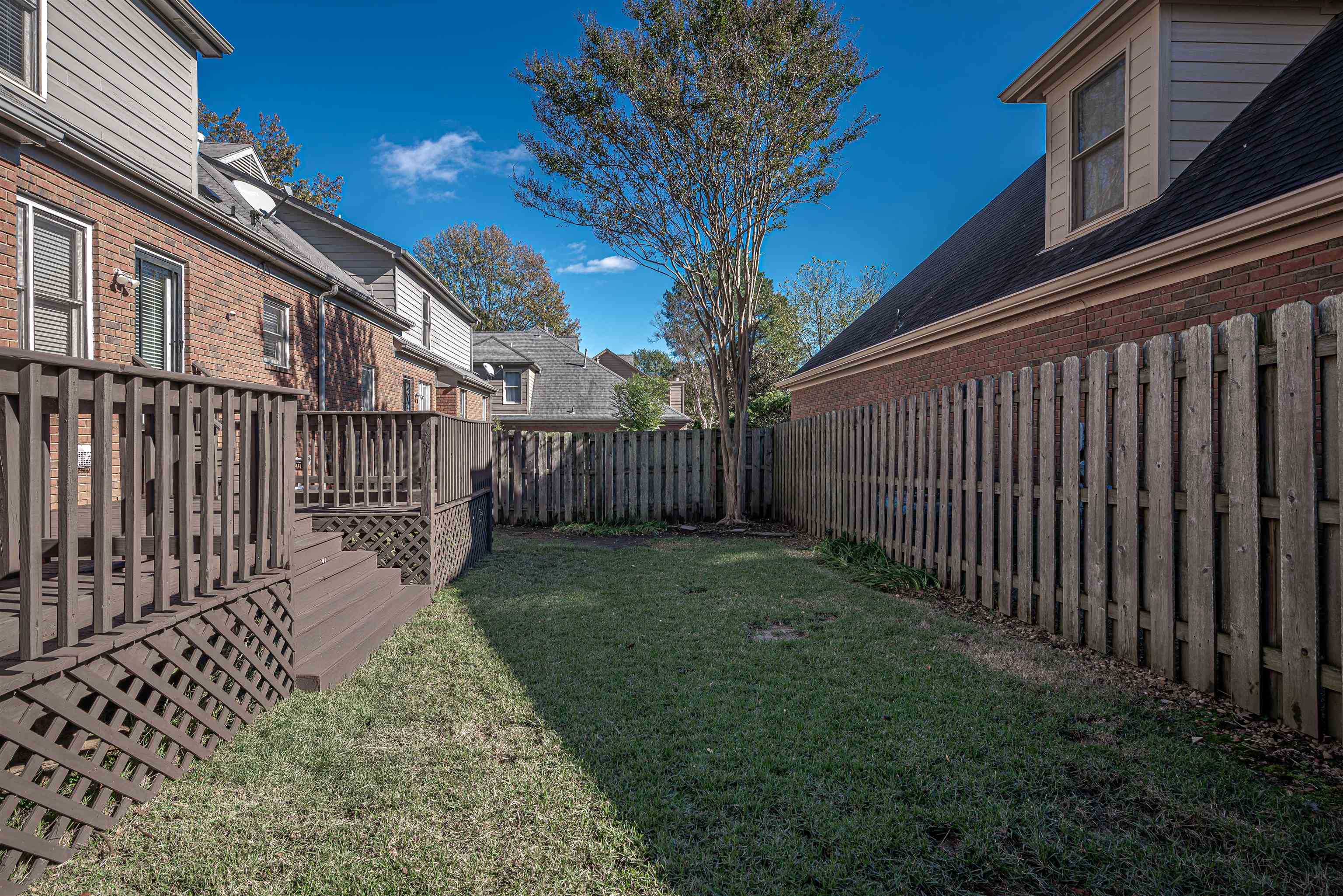 View of yard with a deck