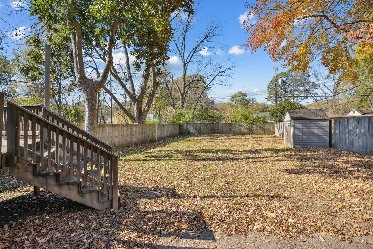 View of yard with a shed