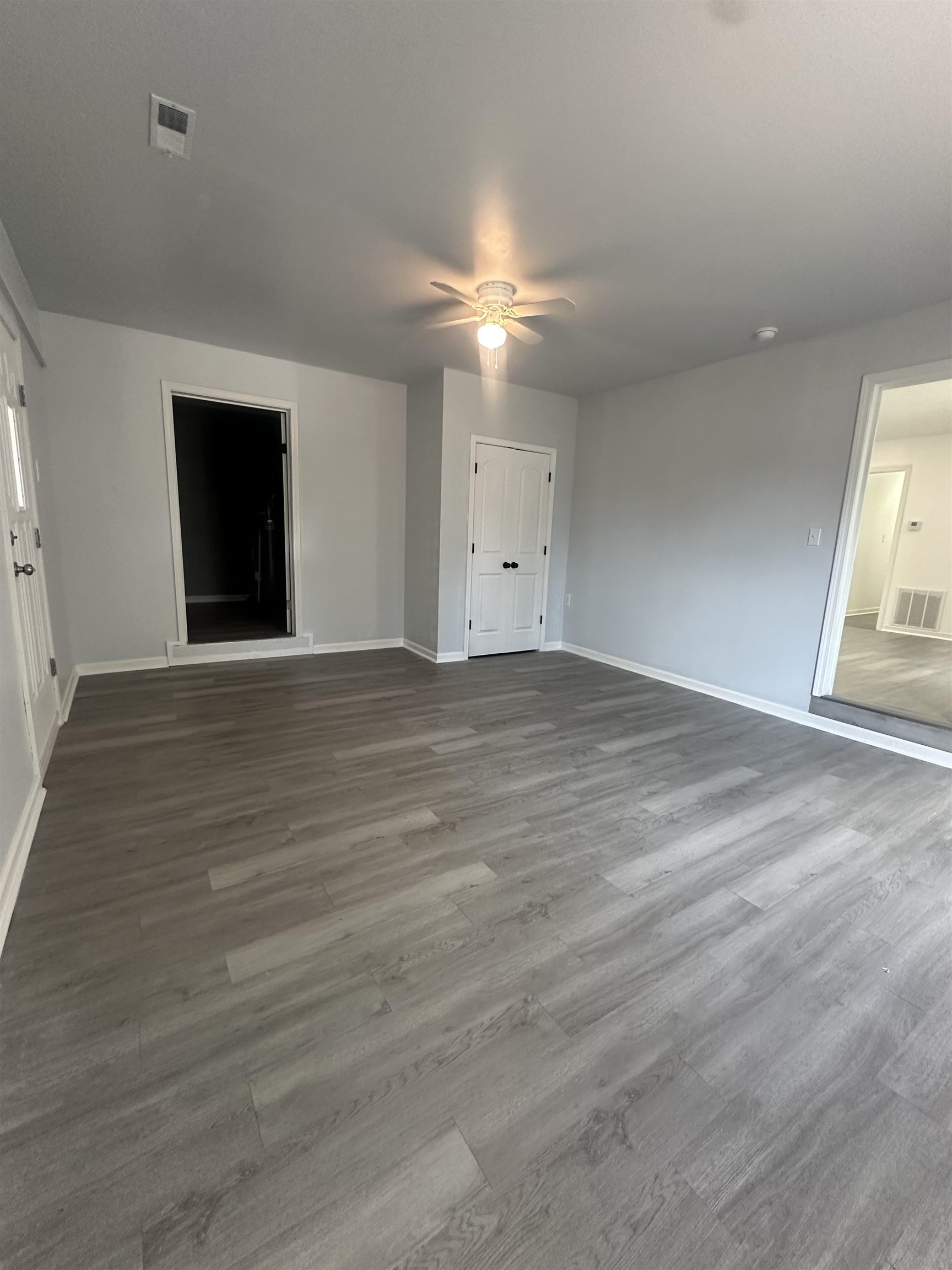 Interior space featuring ceiling fan and hardwood / wood-style floors