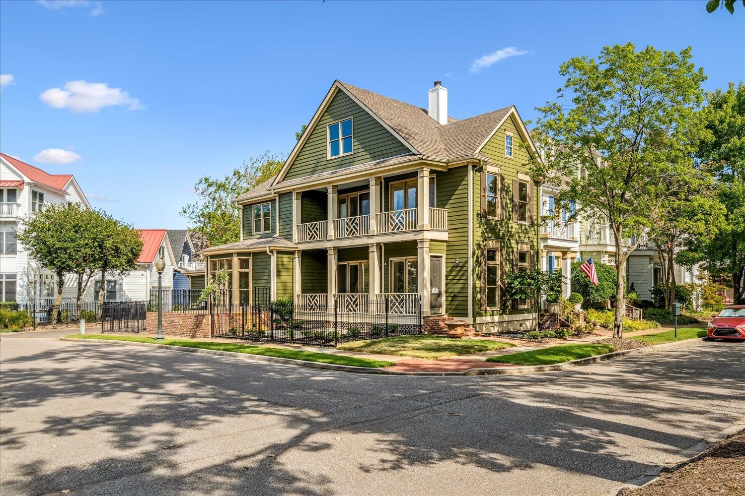 Wonderful Townhome in Harbor Town Proper — Just Steps from the Mississippi River! This beautiful corner-lot townhome offers both charm and convenience in one of Memphis’s most desirable communities. Inside, you’ll find hardwood floors, granite countertops and soaring 9-ft ceilings that create an open, inviting feel.  Enjoy a cozy den complete with a wood-burning fireplace framed by built-in bookcases—perfect for relaxing or working from home. The light-filled breakfast room opens with French doors to a deck overlooking the wrought-iron-fenced garden, a relaxing setting for morning coffee. Upstairs, the spacious primary suite boasts French doors leading to a covered deck with beautiful neighborhood views.  Each of the bedrooms includes its own full bathroom. With fresh interior and exterior paint, this Harbor Town home is truly move-in ready.