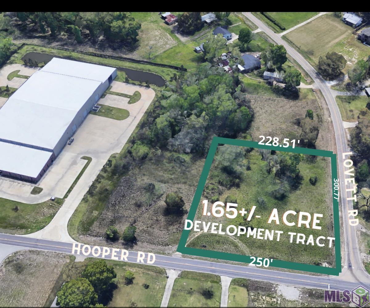 This location is within 1-2 miles of Neighborhood Wal-mart, Sonic Drive-In, Taco Bell, Winn-Dixie, AutoZone, and the well trafficked Joor Rd. intersection. The site is perfect for a quick service restaurant or gas station. Reduced and priced to sell.  The majority of the site is cleared. Culverts are in place with a U shaped gravel drive for ease of access. A 1.65+/-acre tract at the hard corner of Hooper Rd. and Lovett Rd. 228.44+/-feet  fronting  Hooper  Rd.  and  328.80+/-feet  fronting  Lovett.  Frontage being four laned in the near future---75' depth proposed for taking at Hooper frontage.   Flood Zone X- Area of Minimal Flood