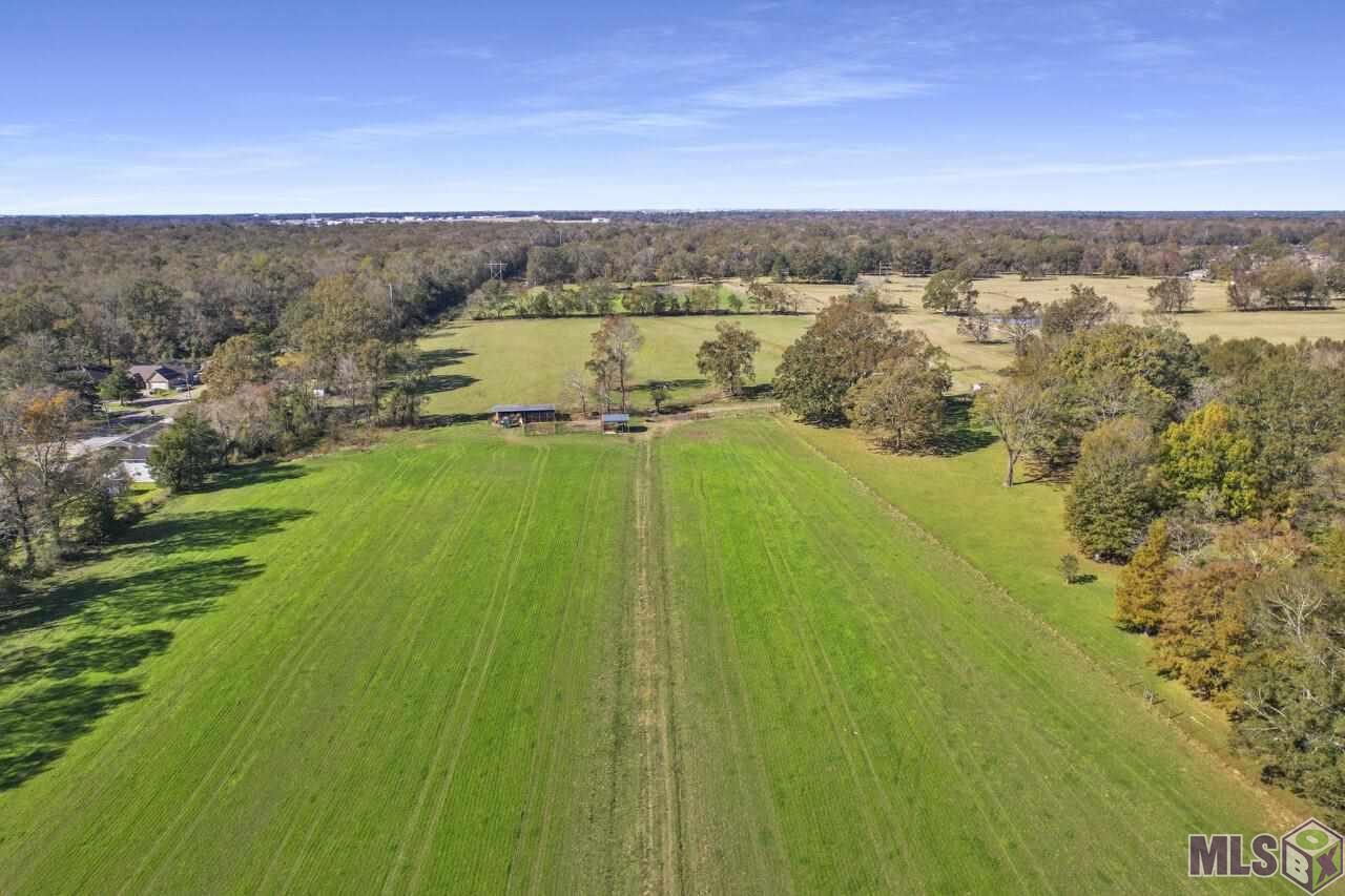 Prime development opportunity.  100+ acres of mostly Flood Zone X residential property in East Baton Rouge Parish.  Selling all 7 parcels together. Multiple accesses available to property.  Call Listing Agent for more info All Farm equipment, hay, catch pen, and carport cover are reserved by seller.