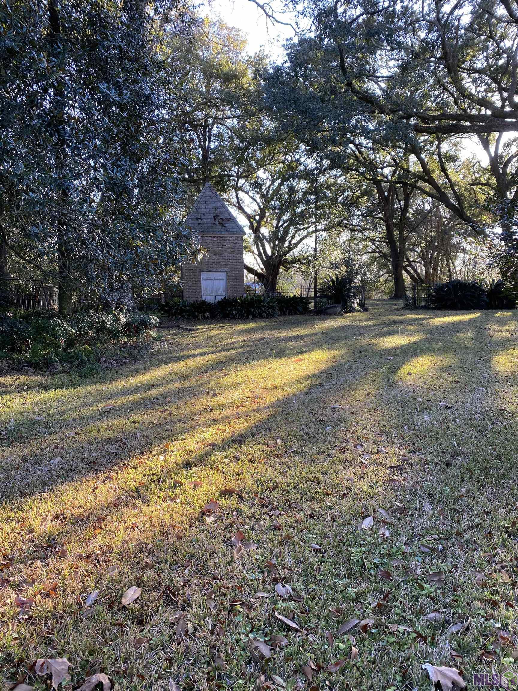 ~6.7 ACRES ON HISTORICAL HIGHLAND ROAD. PROPERTY INCLUDES 3 LEGAL DESCRIPTIONS 92 -1 ACRE LOTS AND 4.7 ACRES WHICH INCLUDES A LARGE A. HAYS TOWN HOME. THE HOME HAS SLATE ROOF, EXTRA LARGE WOOD BEAM FLOORS AND HUGE HOUSE GENERATOR. THE LAND HAS BEAUTIFUL, MATURE LIVE OAKS, CAMELLIAS, SASANQUAS, MAGNOLIAS AND MUCH MORE.