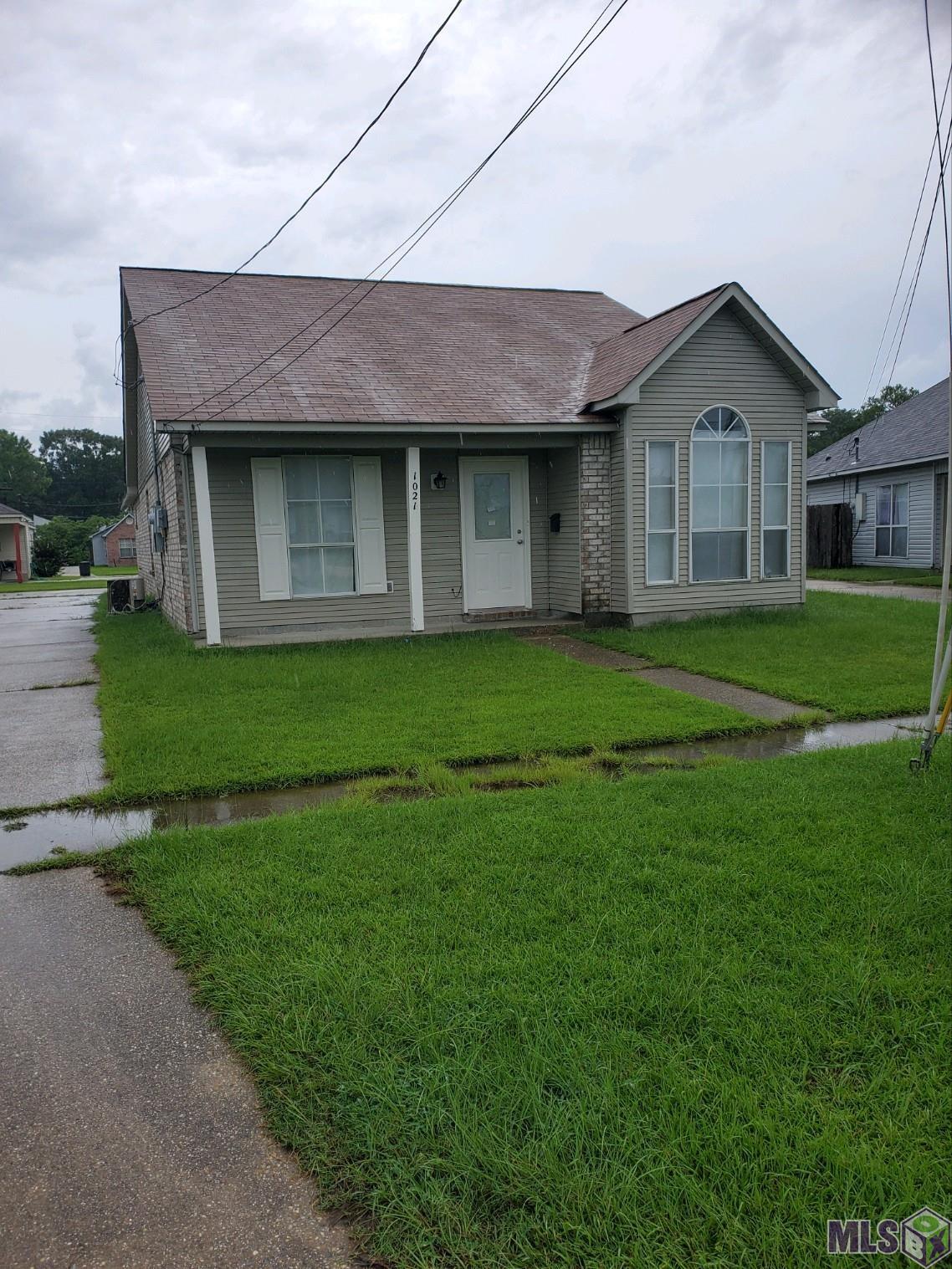 Nice family home. Freshly painted inside and out great floor plan, new ceramic tile, new dishwasher, open patio in back fantastic master bath, island in kitchen, air unit will be repaired or replaced.
