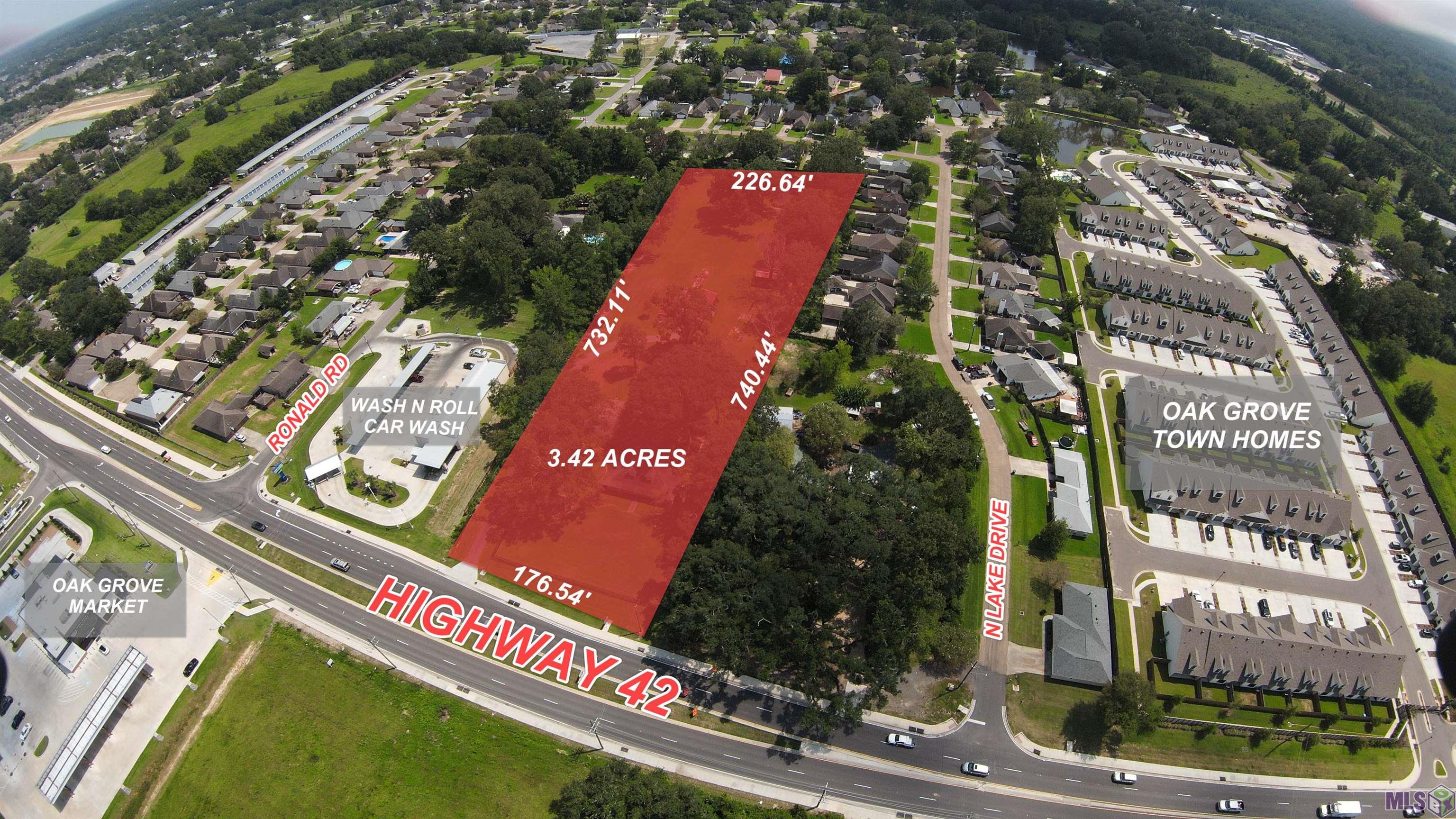 Commercial Property at $6.69psf. Excellent Location on Hwy 42 located in Rapidly Growing Ascension Parish. High Traffic Counts of 24,000 - 27,000 VPD. Many available uses from multifamily, office, or retail. The subject property is a 3.42-acre commercial tract located on Highway 42 near the intersection of Old Jefferson Highway (Hwy 73) and Hwy 42 in Prairieville, LA. Zoning designation of the property is MU-2 (Mixed Use Corridors) which allows a multitude of different commercial uses. Immediately adjacent to Wash N Roll Car Wash, the brand new Oak Grove Market and Meadows at Oak Grove Subdivision, and neighboring the new Oak Grove Townhomes development. All Utilities on Site. Seller financing available to a qualified buyer. 20% down payment is required, followed by payments at a below-market rate amortized at 15 years with balloon payment due at the end of five years. These terms may be open to negotiation for the right prospective buyer. Final approval is at discretion of the seller. Flood Zone X - Did not flood in 2016 or 2021. No Value Assigned on House on Property