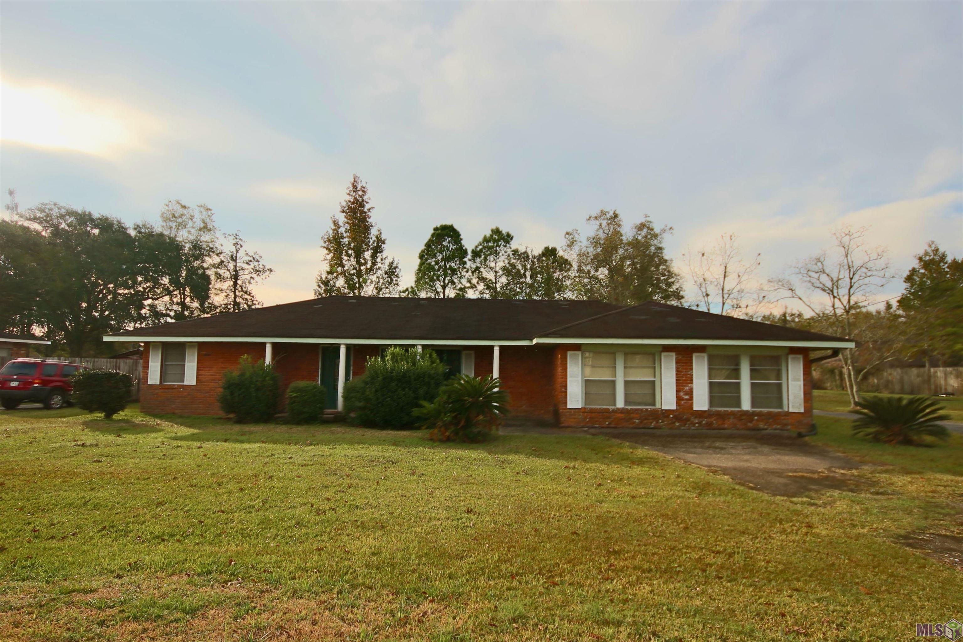 Investment Opportunity!!! This home has been loved for many years and now ready for makeover and new owners.  Situated on a nearly 1 acre lot on Hwy 42 in Ascension parish.  Excellent schools, dining and shopping all nearby.
