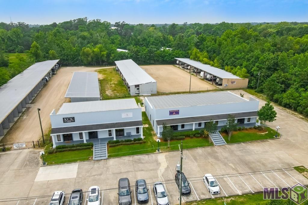 DO NOT DISTURB TENANTS! Property consist of 2 separate buildings with 3 suites each and a fenced RV/boat storage facility with 64 covered spaces and 5 open spaces. Building at 27947; Suite 1-850 sq. ft., 2-1075 sq ft, 3-1350 sq ft, for a total of 3275 sq. ft. of leasable area. Building at 27987; Suite A-1500 sq ft, B-1500 sq ft, C-1500 q ft., for a total of 4500 sq. ft of leasable area. RV/boat storage facility; Side A - 26 units - 14,560 sq ft, Side B - 10 units - 4200 sq ft., Side C - 14 units - 6360 sq. ft., Side D - 14 units - 7420 sq. ft. for a total of 64 units and 32,540 sq. ft. of covered leasable area, plus 5 open/not covered spaces. Viewings can be scheduled by appointment during inspection period, once property is under contract. DO NOT DISTURB TENANTS. *Structure square footage nor lot dimensions warranted by Realtor.