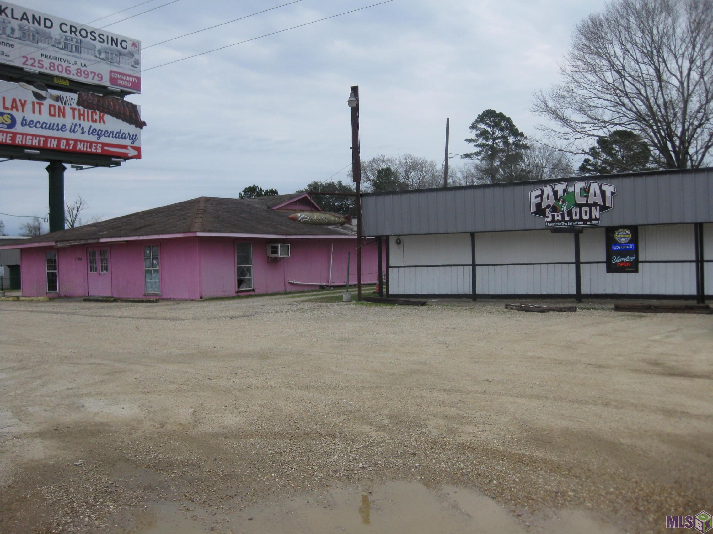Great Location to Start Your Business!!!  1.49 Acres on Airline Hwy. in a High Traffic Area.  All buildings on property shall be sold at NO value.  Building is currently leased as a bar.  Small house is rented.  Do Not Disturb the tenants.