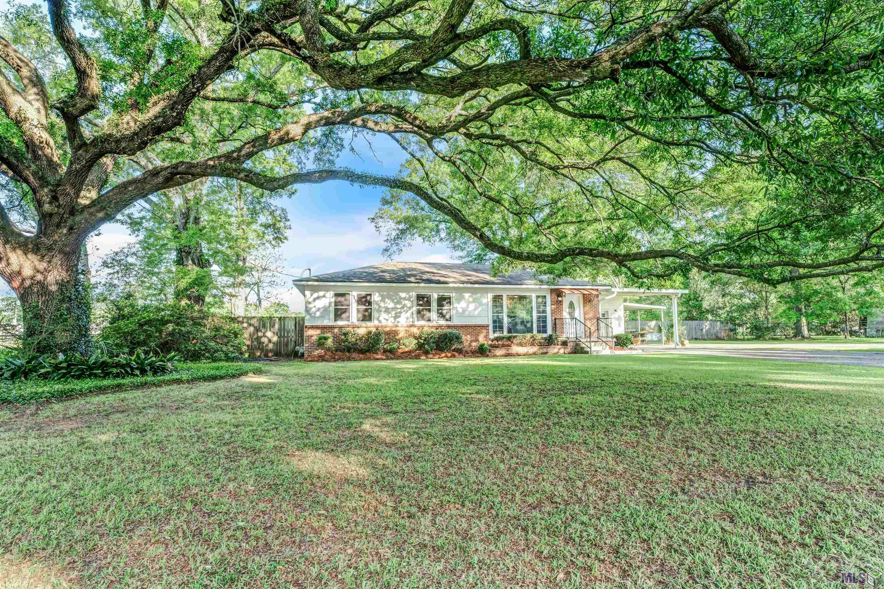LOOK NO FURTHER! This home was completely renovated in 2017!  Home offers 3 bedrooms, 2 baths and the only thing left to do is move in! Before entering, you will be greeted by the large 1/2 acre lot and a beautiful live oak tree in the front yard.  A few highlights include wood look tile floors throughout, custom cabinets, trendy light fixtures, and energy efficient windows.  The kitchen is an entertainer's dream with tons of counter space, 3 cm slab granite, a farmers sink, stainless steel appliances, and soft close drawers. You'll love winding down in the large master suite which offers a large freestanding soaking tub and a separate job built shower with multi body sprayers.  The large backyard is also a treat consisting of a large rear porch and a separate gazebo. Other features include a tankless water heater, newer electrical wiring, and the roof is approximately 6 years old, This is truly a must see!