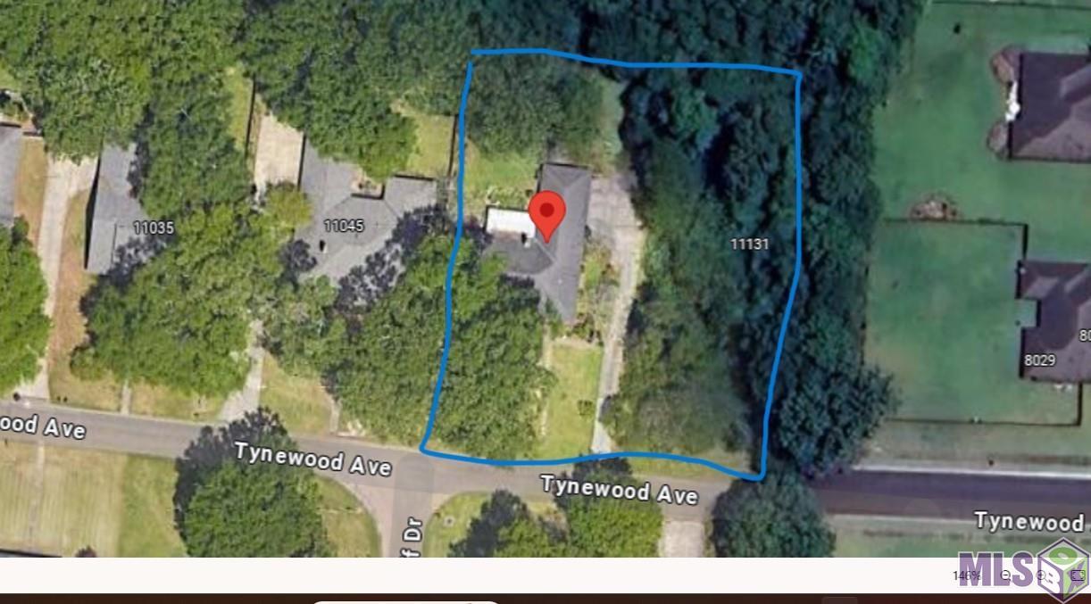 Wooded subdivision Lot.  Price includes adjacent lot with updated home.