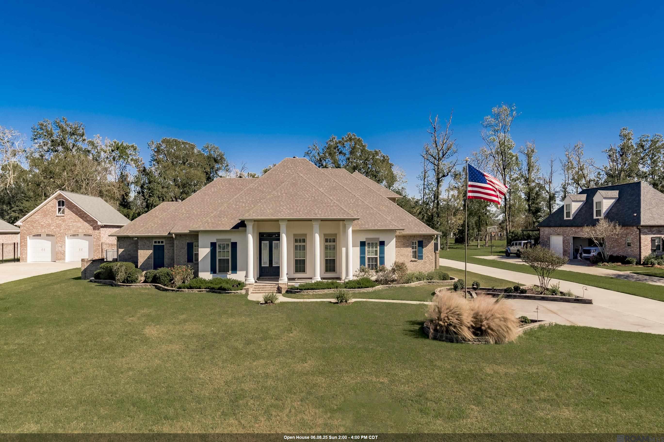 Welcome Home! This exceptional property is nestled on a beautiful one-acre lot just off I-10 in Ascension Parish, offering convenient access to Baton Rouge, New Orleans, and the Gonzales Airport. Boasting over 3,700 square feet of living space, this 5-bedroom, 4.5-bath home is the epitome of luxury living. Outside, you’ll find a private oasis with a glistening gunite pool, spa, and an impressive outdoor pavilion featuring a fully equipped kitchen, sitting area, half bath with a washer/dryer, and an outdoor shower. Inside, the grand foyer and dining area set the stage, complemented by a gas fireplace and a wall of windows that flood the living room with natural light. The attention to detail throughout is unmatched. The spacious eat-in kitchen is a chef’s dream, outfitted with a Wolf range, Sub-Zero refrigerator and freezer, wine chiller, stunning Lyptus cabinets, quartz countertops and large pantry. The primary suite is a retreat unto itself, complete with a large garden tub, custom shower, water closet, heated bathroom floors and an expansive walk-in closet. Upstairs, a large bedroom with an en-suite bath offers versatility as a guest suite or game room, complete with a massive walk-in closet. Additional features include a whole-home generator, a new roof, flood sensors behind every water source, fresh paint throughout, and so much more. This home truly has it all. Schedule your private showing today, don’t miss this rare gem!